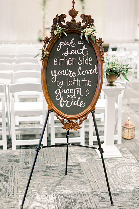 community-church-wedding-pick-a-seat-sign-at-ceremony