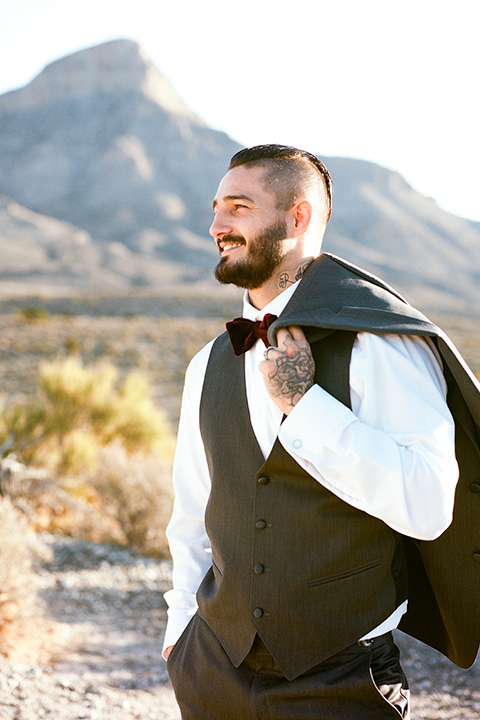 red-rocks-shoot-groom-standing-alone-close-up