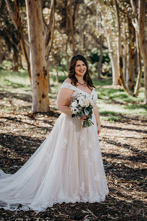 la-jolla-wedding-bride-bride-in-a-tulle-ballgown-with-a-crystaled-bodice-and-cap-sleeves