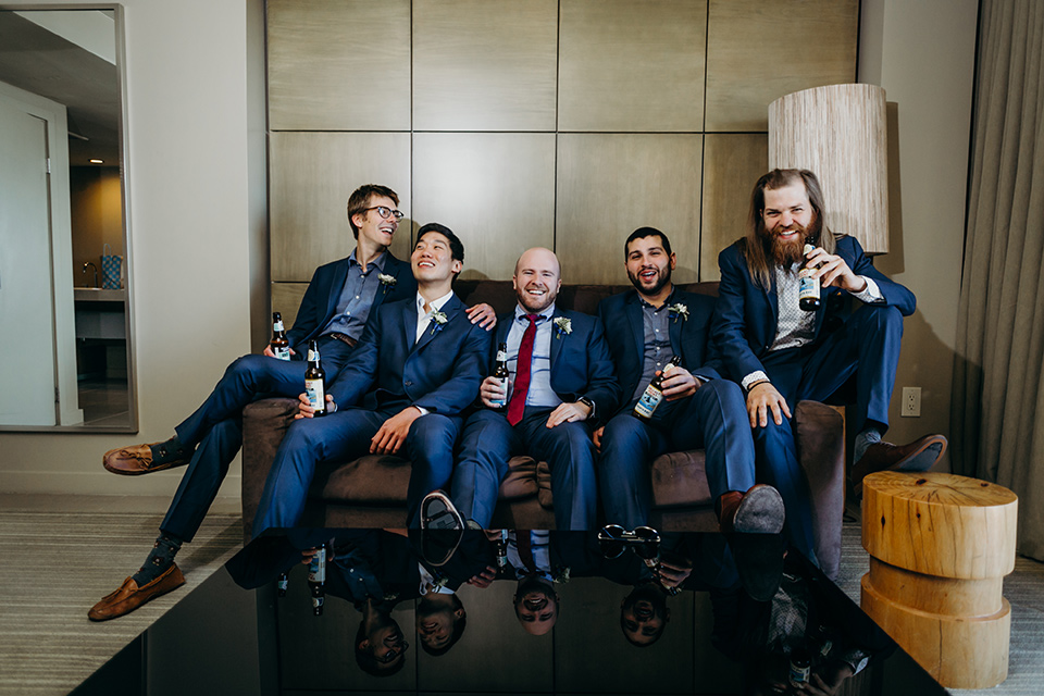 la-jolla-wedding-groomsmen-in-blue-suits-and-white-shirts-groom-in-blue-suit-with-a-blue-shirt