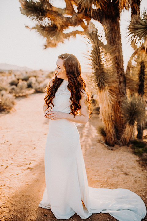  bride in a high neckline gown with lace details 