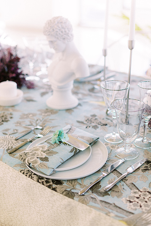  floral linens with matching napkins on reception table