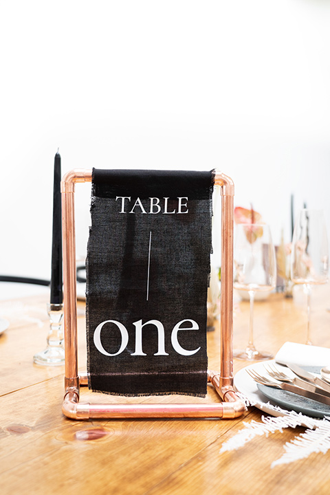  black menu cards and table numbers 