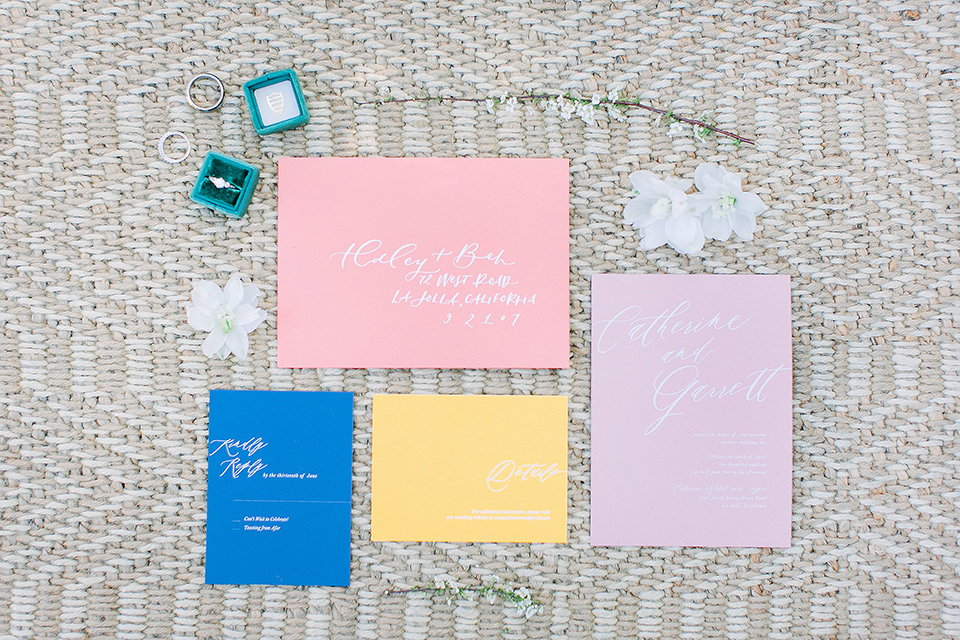  invitations in multicolored papers and white calligraphy