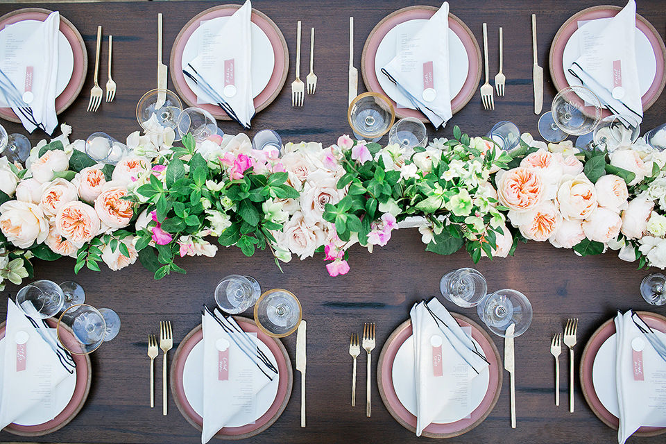  wooden table with spring florals and white table linens