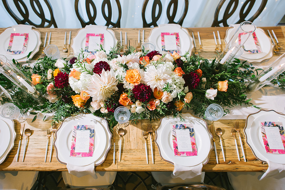  rustic chic table with pink and burgundy flatware details