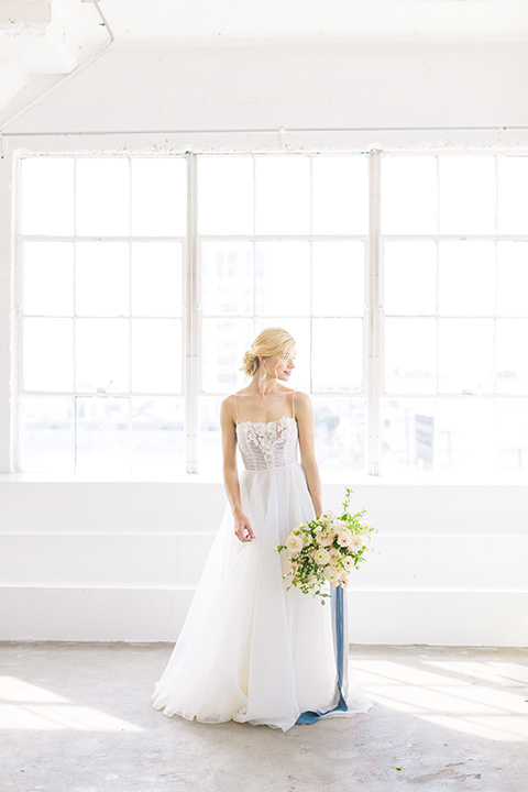  bride in a flowing modern tulle gown