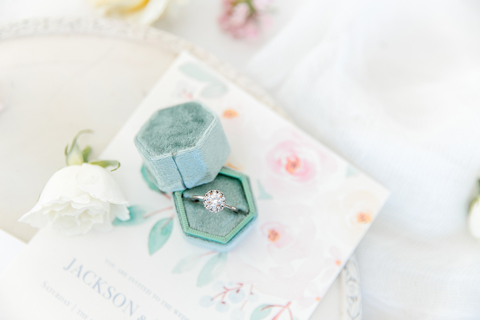  the wedding ring with a teal velvet box