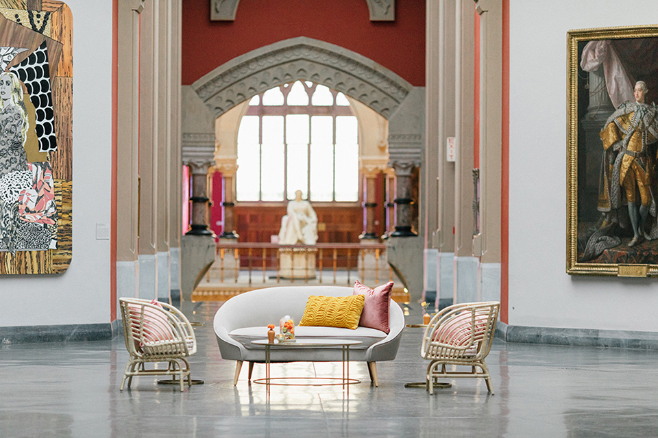  reception furniture with white couches and blush pink poofs