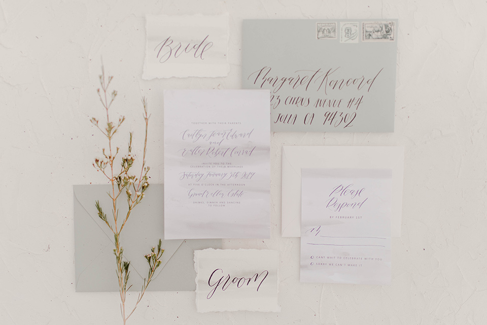  white invitations with grey details