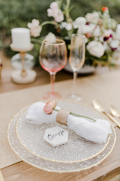 white and silver plate and décor with gold flatware