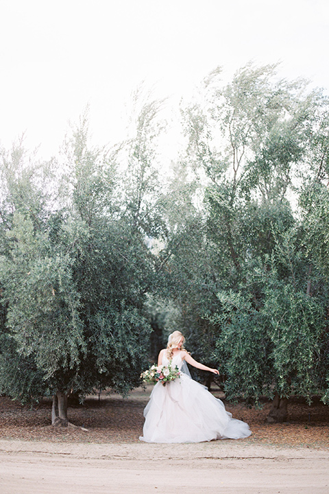 bride in a white ballgown with a tulle skirt and lace bodice detailing