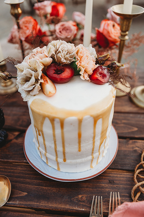  white cake with gold trim 