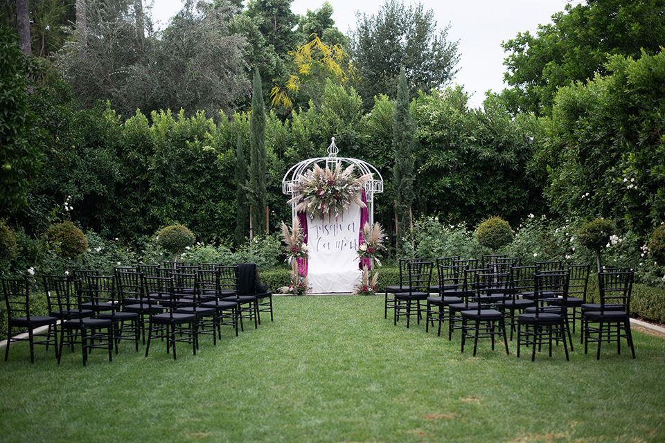  bride in a black gown with a black veil 