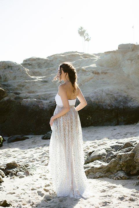  bride in  flowing gown with embellishments