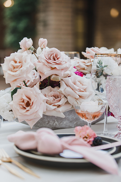  reception table with pink and white linens and flowers 
