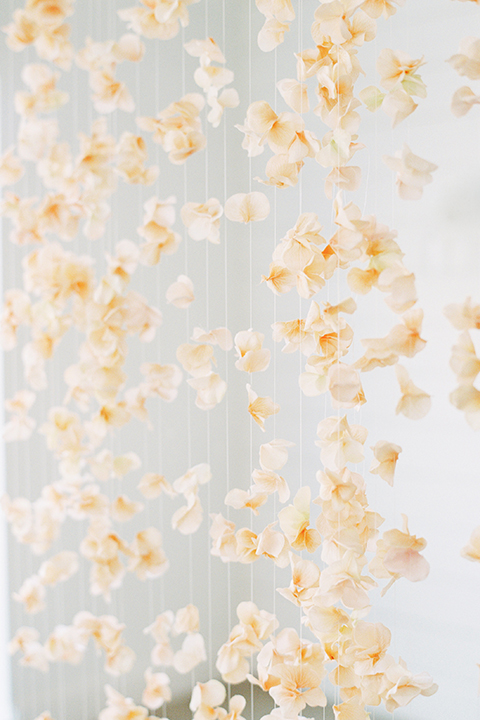  ruffled shoot in texas – bride in a romantic casual wrap dress and the groom in a white long tie