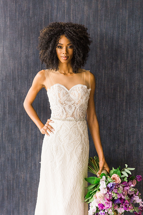  Las Vegas wedding with purple details and the bride in a strapless gown and the groom in a black velvet tuxedo 