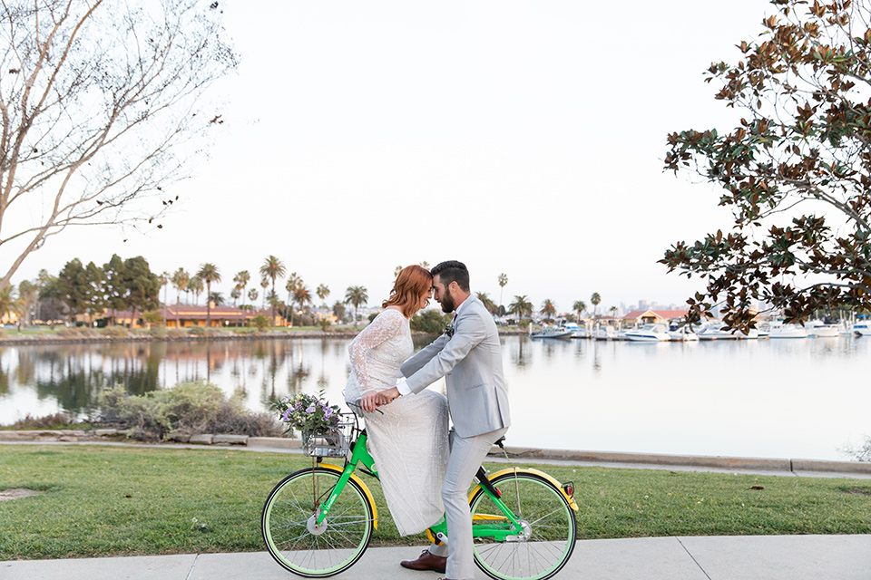  San Diego wedding with purple and grey touches and the groom in a light grey suit 