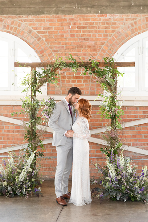  San Diego wedding with purple and grey touches and the groom in a light grey suit 