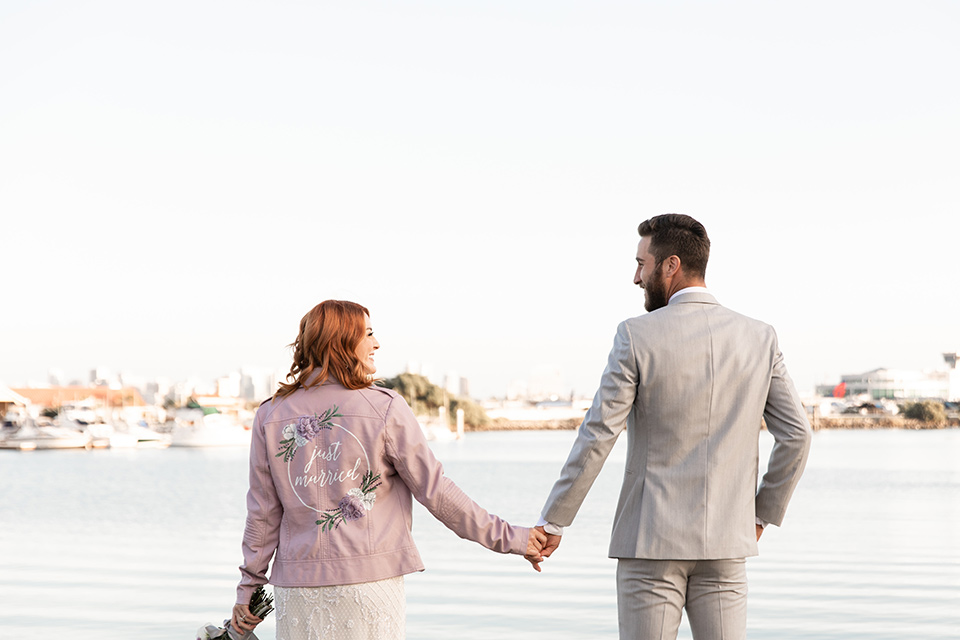  San Diego wedding with purple and grey touches and the groom in a light grey suit 