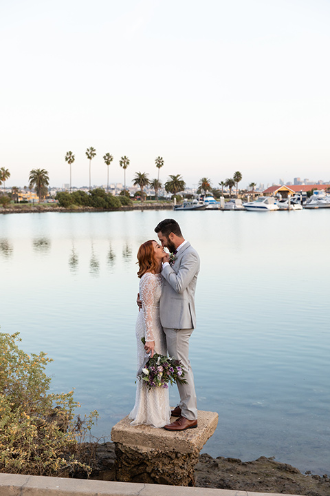  San Diego wedding with purple and grey touches and the groom in a light grey suit 