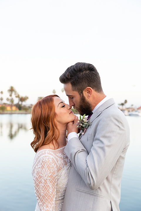  San Diego wedding with purple and grey touches and the groom in a light grey suit 