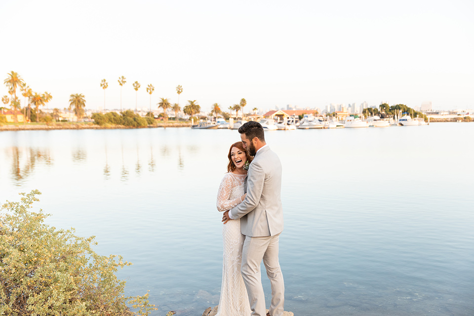  San Diego wedding with purple and grey touches and the groom in a light grey suit 