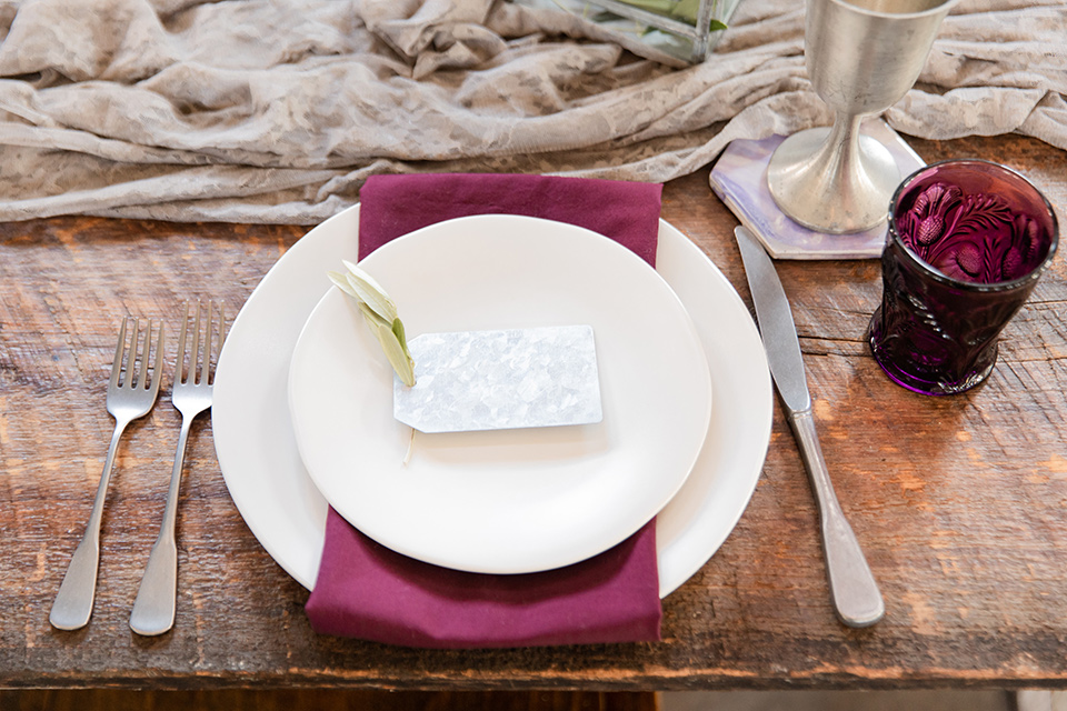  San Diego wedding with purple and grey touches and the groom in a light grey suit 