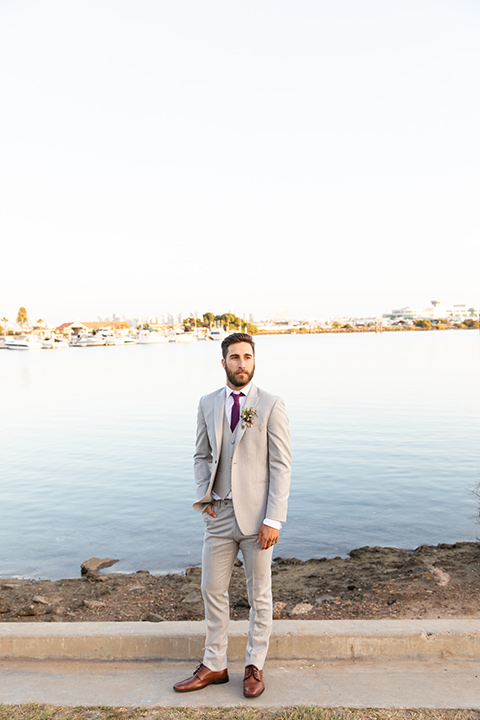  San Diego wedding with purple and grey touches and the groom in a light grey suit 