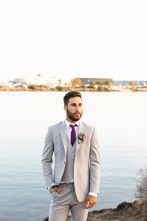  San Diego wedding with purple and grey touches and the groom in a light grey suit 