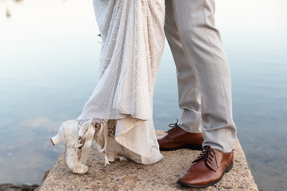  San Diego wedding with purple and grey touches and the groom in a light grey suit 