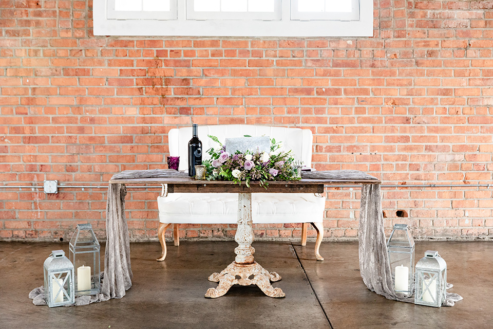  San Diego wedding with purple and grey touches and the groom in a light grey suit 