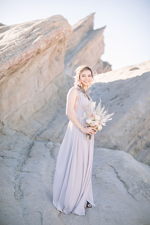  bride in a soft lilac colored gown for a dessert elopement 