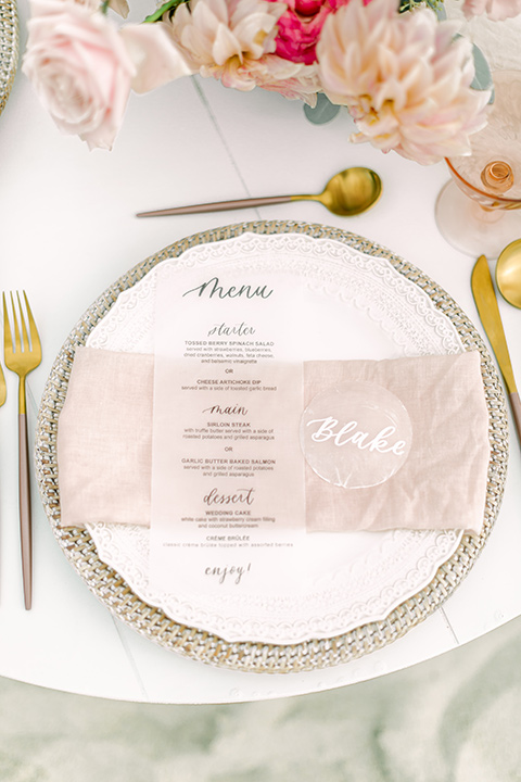  a coastal beach theme with a blush and beige wedding color scheme – table décor and flatware