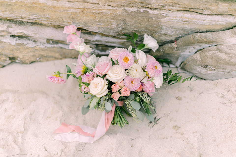  a coastal beach theme with a blush and beige wedding color scheme – florals