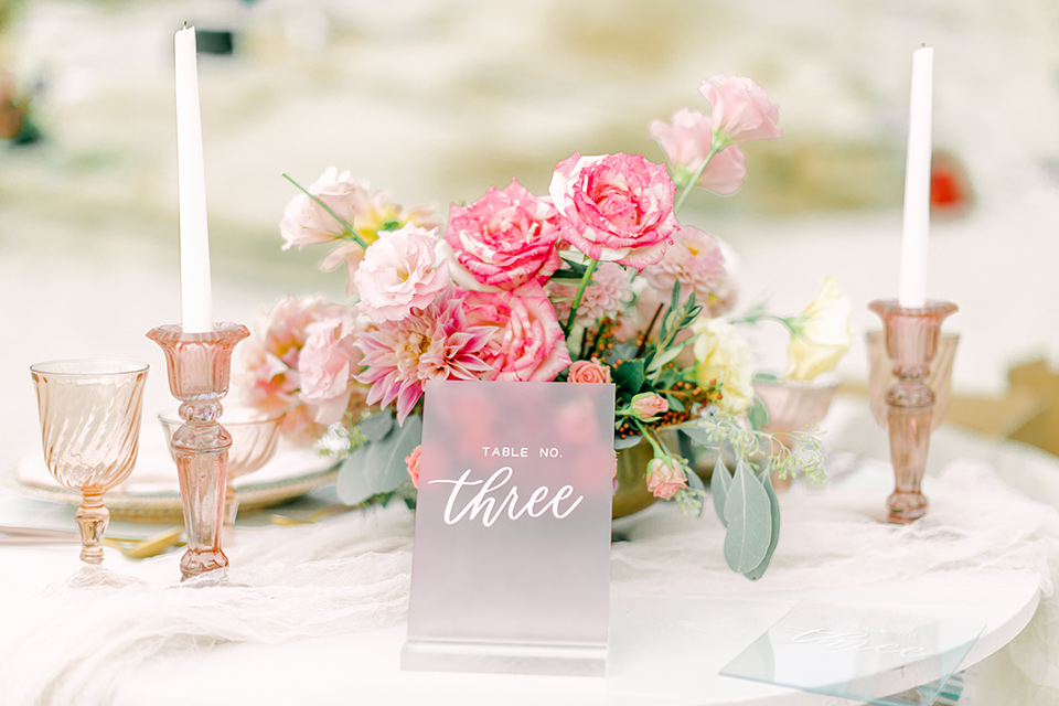  a coastal beach theme with a blush and beige wedding color scheme – tablescape