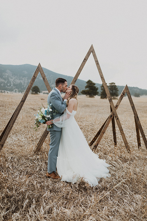  couple exchanging vows in a colorado meadow
