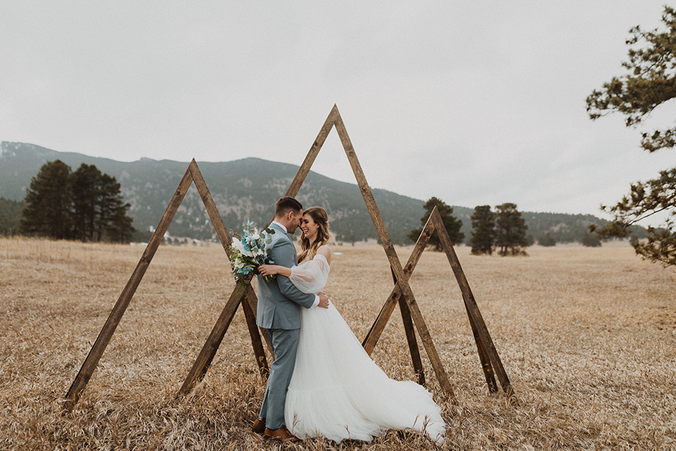  couple exchanging vows in a colorado meadow 