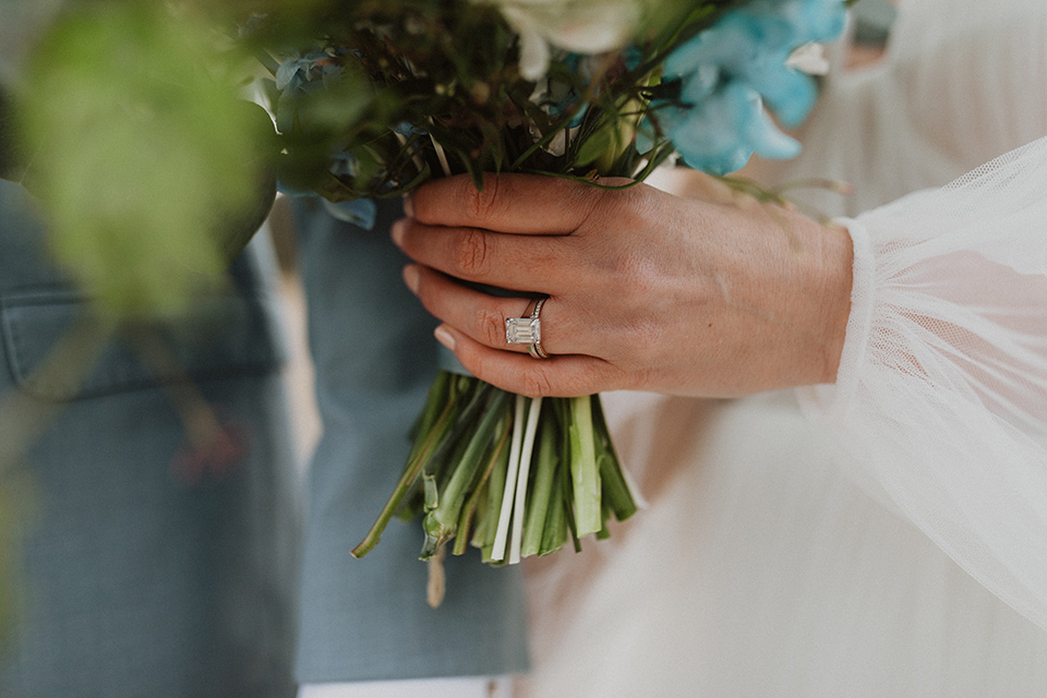  close up on rings and flowers at the Colorado elopement 