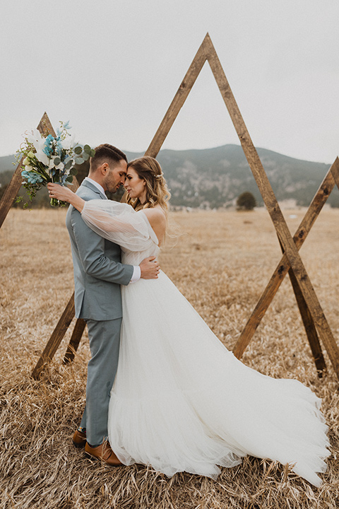  couple exchanging vows in a colorado meadow