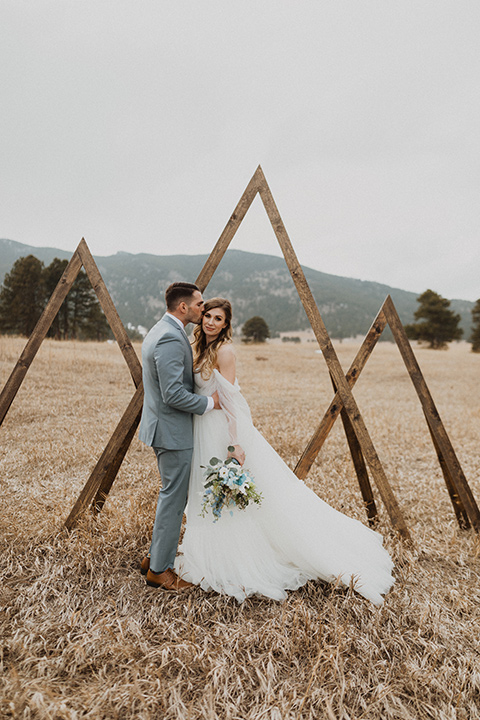  couple exchanging vows in a colorado meadow 