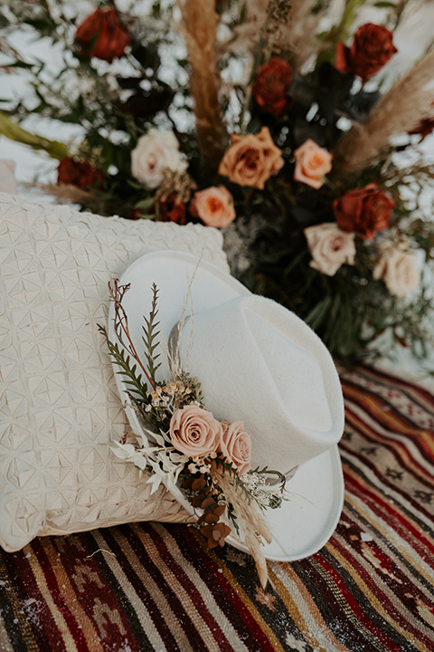  grand tetons elopement in the winter with snow on the ground with the bride in a lace gown and the groom in a rose pink suit – wedding decor 