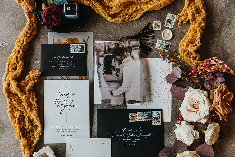  modern and colorful wedding with the bride in an off-the-shoulder dress and the groom in an all-black tuxedo – invitations 